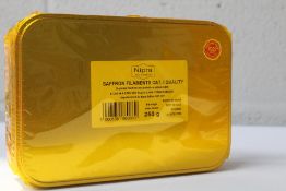A Nipra 250g tin of Saffron Filaments Cat . I Qual