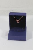 A Swarovski Clear Pink Pave Crystals in Rose Gold,