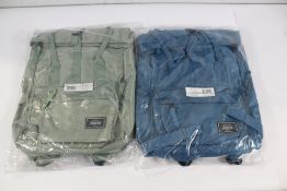 Two American Tourist Urban Groove City backpacks (