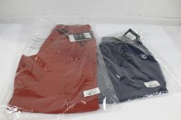 A men's Outdoor Research Zendo pants in brick (Siz