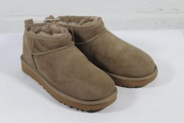 A pair of as new Ugg Classic Ultra Mini Boots in S