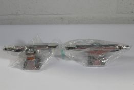 Two Stage 11 skateboard trucks to include 109 poli