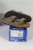 A pair of men's Birkenstock Arizona leather sandal