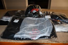 Four items of as new Redbull Racing Clothing to in