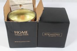 Approximately twenty Benevolence Los Angeles Scented Candles - Eucalyptus & Orange.