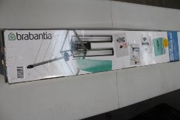 A Brabantia Wallfix Dryer 24 M with Storage Box (Viewing recommended).