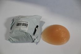 Approximately fifty five Nude silicone bra inserts - enhancers, various sizes.