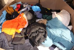 A pallet of pre - owned clothing and related items.