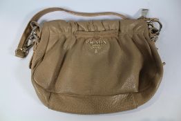 A pre-owned handbag (No authentication, viewing recommended).