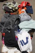 Five boxes full of assorted pre-owned clothing to include Adidas, Fila and Puma.