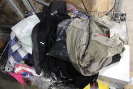 A large quantity of assorted as new clothing and related to include Reebok, Zara SRPLS and Primark (