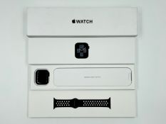 A pre-owned Apple Watch SE 2nd Gen (A2722/GPS, 40mm) in Midnight Aluminum with Black Nike Sport Band
