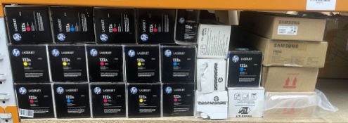 A quantity of assorted printer ink/toner cartridges.