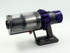 A pre-owned Dyson V10 Animal Cordless Vacum Body, Battery and Bin (Tested, working. Some damage to b
