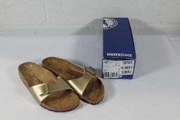 A pair of as new Birkenstock Madrid BS Sandals in Gold, Size UK 7 (Box Damaged).