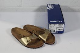 A pair of as new Birkenstock Madrid BS Sandals in Gold, Size UK 5 (Box Damaged).