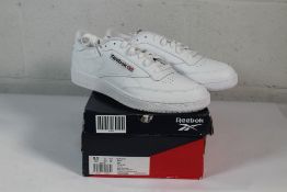 A pair of as new Reebok Club C 85 Trainers in White/Core Black, Size UK 8.5.
