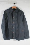 A men's as new Huckberry Flint and Tinder Flannel-Lined Waxed Trucker Jacket - Dark Blue (M).