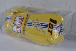 A pair of as new Yokkao 14oz First at the Racing Boxing Gloves in Yellow.