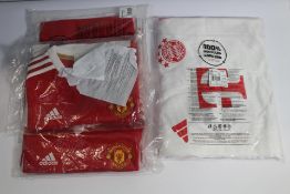 An as new Adidas FC Bayern 23/24 Home Jersey, Size UK L (4066761035572) and three as new Adidas Manc
