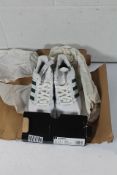 An as new pair of Adidas Busenitz Trainers in White/Green, Size UK 9 (Box Damaged).