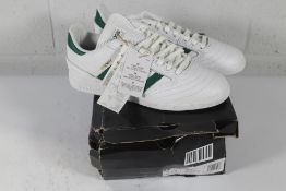 An as new pair of Adidas Busenitz Trainers in White/Green, Size UK 8 (Box Damaged).