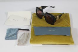 Gucci Sunglasses Black Frame and Brown Lens with Gold Colour Safety Chain Contained in a Green Velve