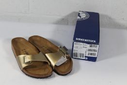 A pair of as new Birkenstock Madrid BS Sandals in Gold, Size UK 7.5 (Box Damaged).