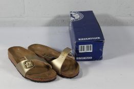 A pair of as new Birkenstock Madrid BS Sandals in Gold, Size UK 5 (Box Damaged).