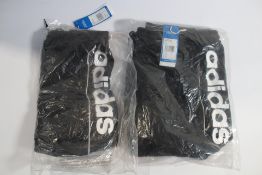 Two as new pairs of Adidas Itasca Shorts in Black, Sizes 1x UK XS and 1x UK L.