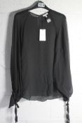 An as new Reiss Liv Blouson Sleeve Sheer Blouse in Black, Size 8.