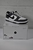 A pair of Nike by You Dunk Lows (UK 6).
