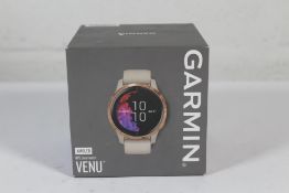 An as new Garmin Alomed Venu GPS Smartwatch, EAN 753759227890.