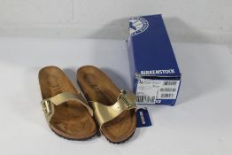 A pair of as new Birkenstock Madrid BS Sandals in Gold, Size UK 5.5 (Box Damaged).