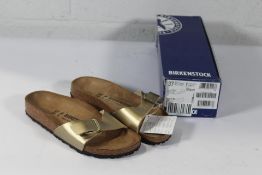 A pair of as new Birkenstock Madrid BS Sandals in Gold, Size UK 4.5 (Box Damaged).