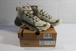 A pair of women's as new Salomon Cross Hike 2 Mid Gore-Tex Walking boots in Feather Gray/Olive Night