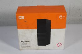 An as new WD MyBook 6TB Desktop Storage, EAN 718037850689.