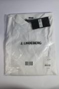 An as new J.Lindeberg Heath Regular Fit Golf Polo in White, Size L.