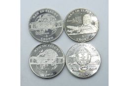 A lot of 4 'Man in Flight' Isle of Man Crowns, issued in 1994-95. A great thematic gathering!