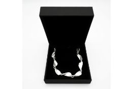 Silver Tumbling Leaf Bracelet