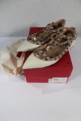 A pair of pre-owned Valentino Garavani Rockstud Ballerina Flat Shoes (EU 39.5).