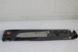A Zwilling Pro Santoku chef knife (Model No 38407 - 180 (7