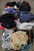 Five boxes full of assorted pre-owned clothing to include Adidas, Le Coq Sportif and Puma.