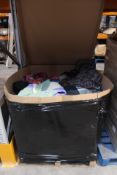 A Pallet of Pre-Owned Clothing and Related Items.