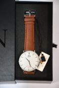Five Zenn Classique watches with brown strap and silver surround.