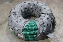 A Saturno L PVC-P hose reinforced with a green anti-shock rigid PVC spiral (50m).