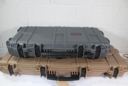 Two Nuprol Hard Cases.