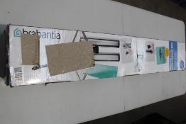 A Brabantia Wallfix Dryer 24 M with Storage Box (V