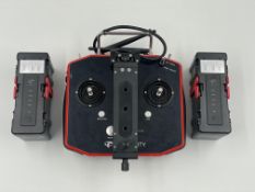 A Flyability Elios 3 Remote Controller (TDS-FLYA), two Flyability Elios 3 Battery Packs and a LED Pa