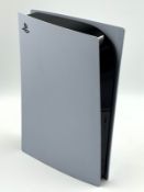 A pre-owned PlayStation 5 Disk Edition with two controllers, HDMI and USB-C cables (Factory reset).